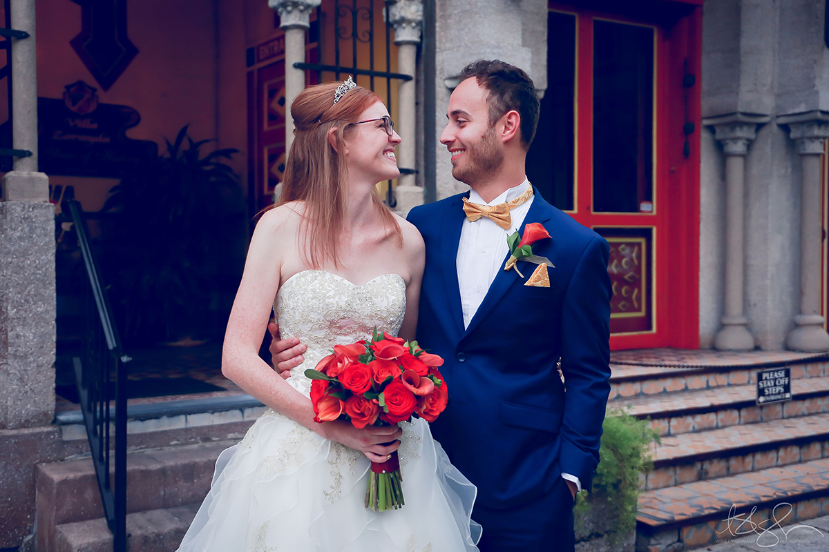 Newly Wed couple standing on the stair way leading into Villa Zorayda Museum