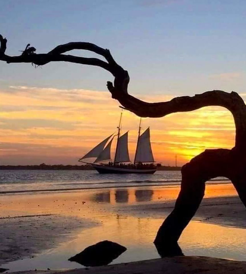 Sunset view looking at the Schooner Freedom sailing