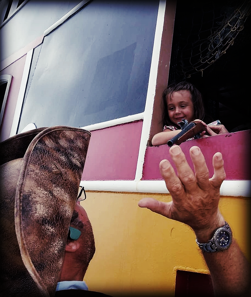 Pirate  giving high five to child, Black Raven Adventures