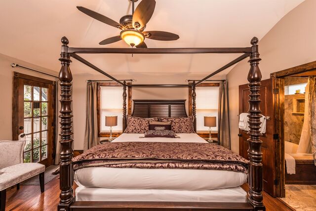 Amethyst room — premium first-floor king with air-jet tub