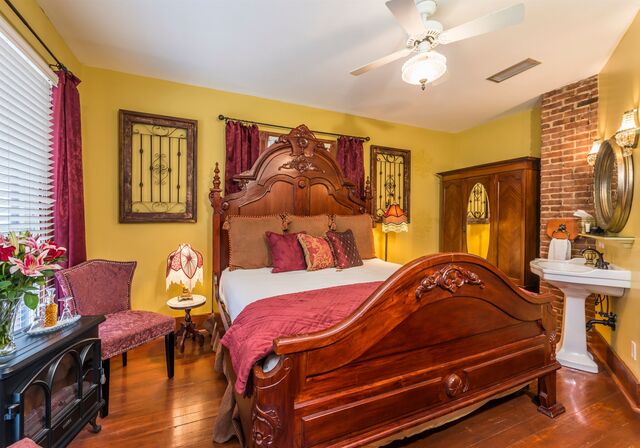 Garnet room — dark red and wood accents